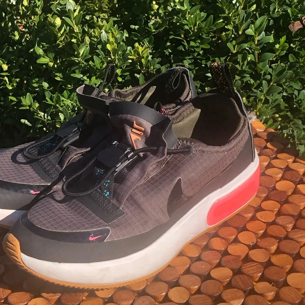Nike Kids Gray Slip-On Sneakers with Pink Heel Accent